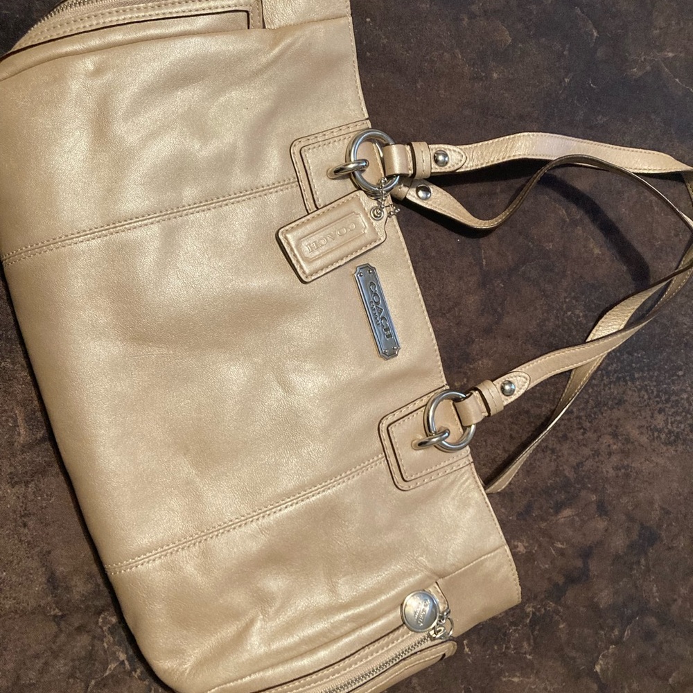 Shimmering tan Coach bag